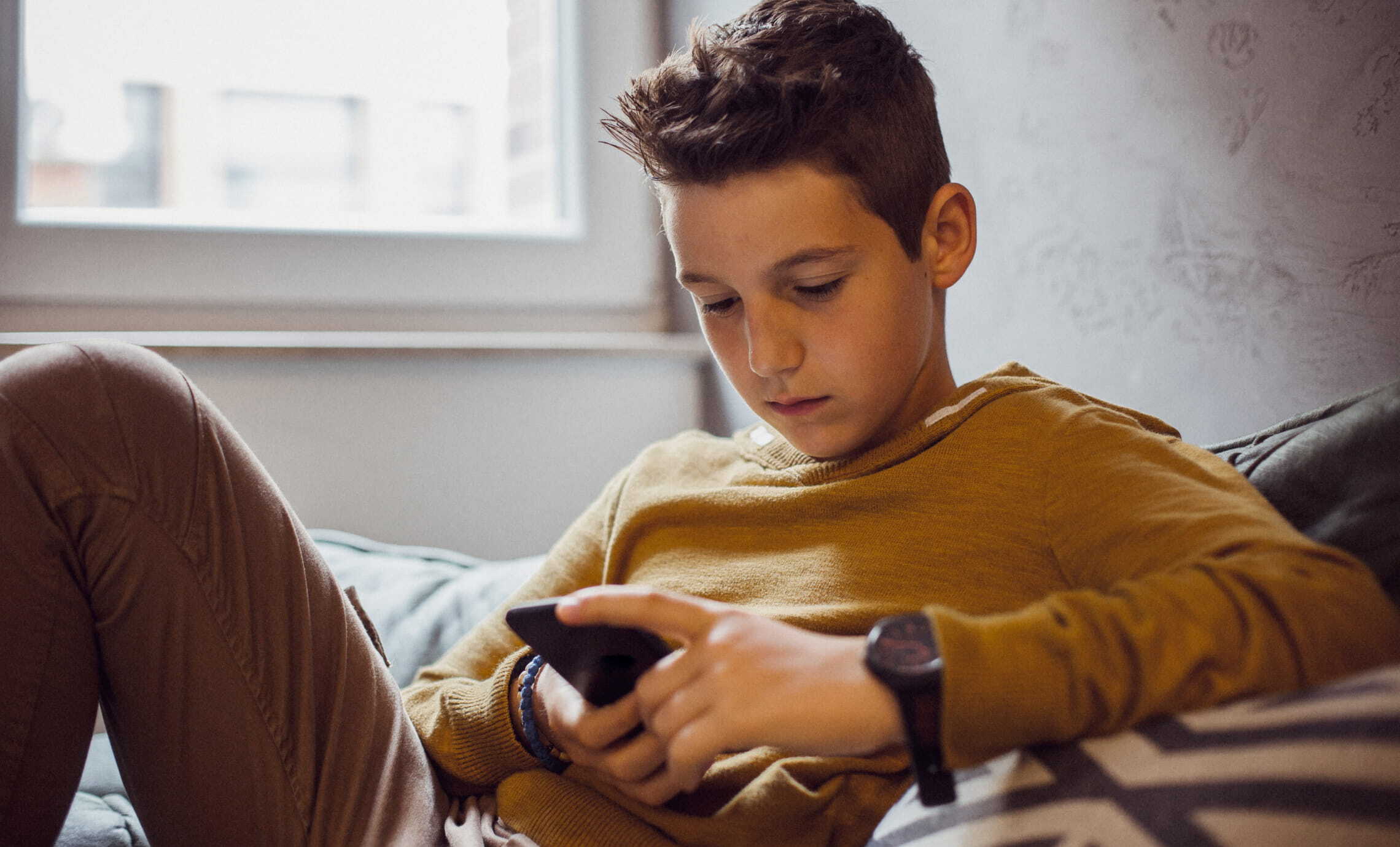 A child using a smartphone