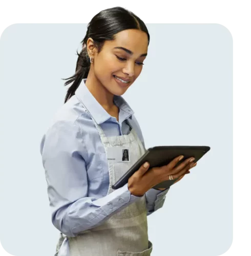 Retail worker using tablet