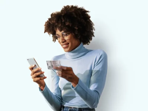 Woman inputting her UK driving licence into her DigitalID on her smartphone