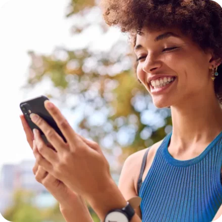 Intro smiling woman looking at phone