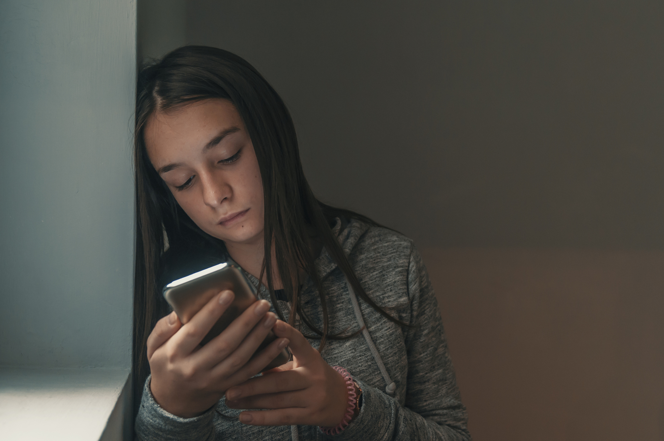 Sad and contemplative young woman