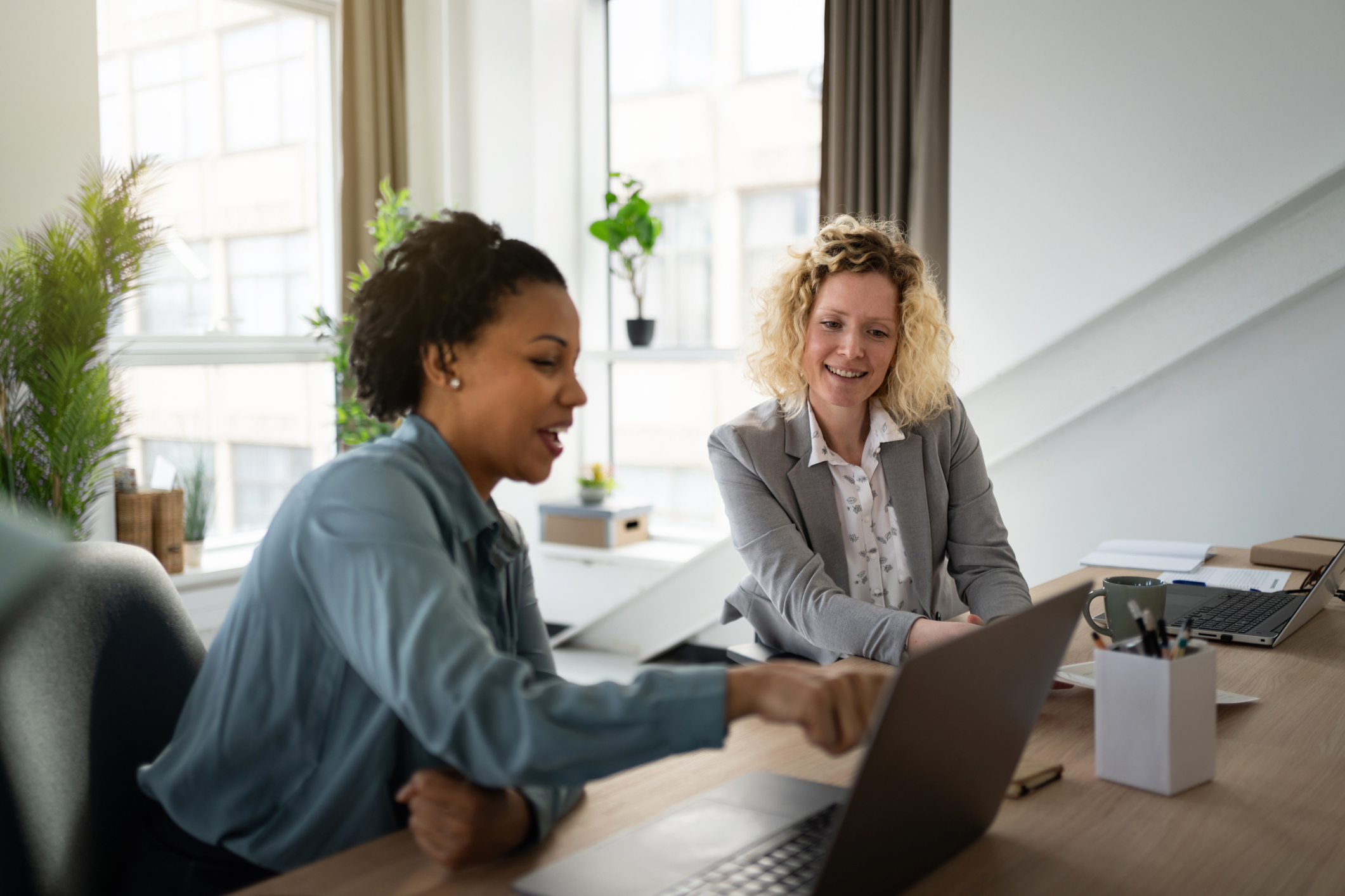 Dedicated multiracial businesswomen working together at the office