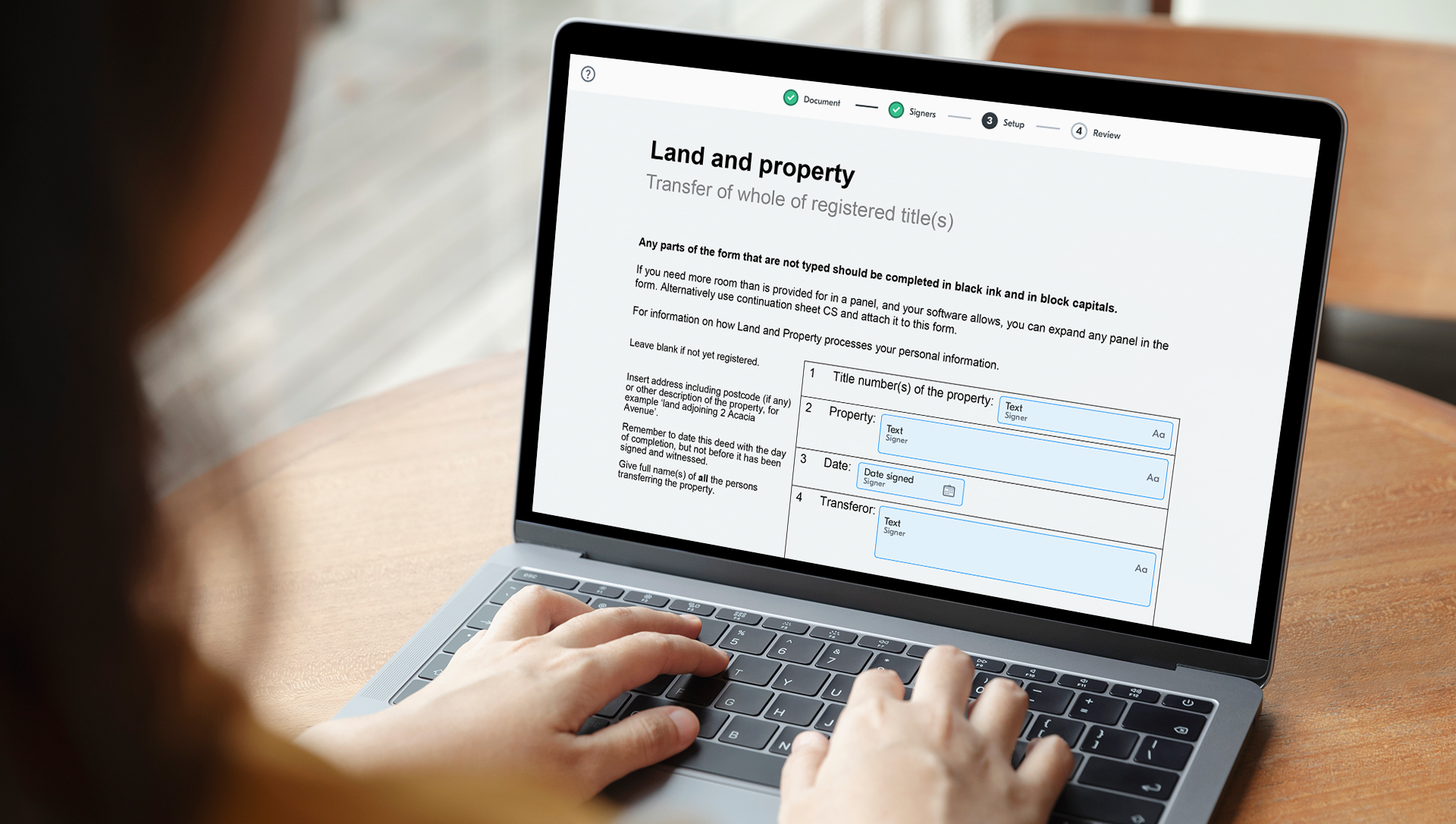 Person completing eSignature form using electronic witnessing in line with HM Land registry