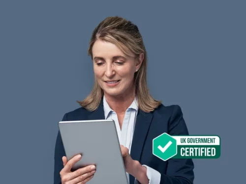 Woman in business attire using a tablet