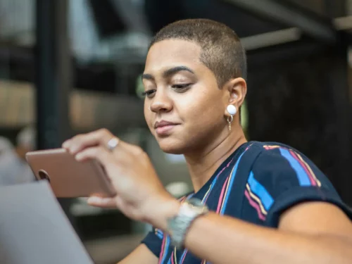 Woman scanning a document with her smartphone