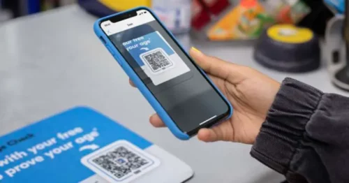 User scanning Yoti QR code with their smartphone