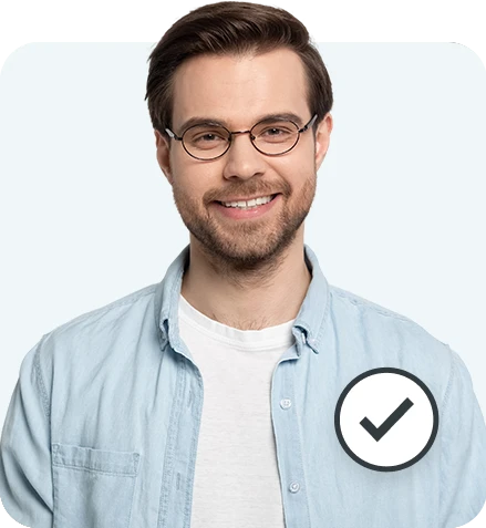 Man with glasses smiling